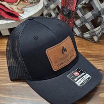 The Crucible's Fire Trucker Hat with Leather Patch